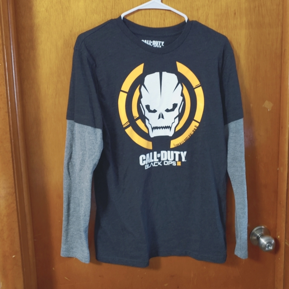 PlayStation 3 Call of Duty Black Ops Game and Call of  Duty tshirt.
